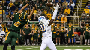 South Dakota State's Colby Humphrey (22) defends a pass intended for North Dakota State's Bryce Lance (5) during the Dakota Marker game at the FARGODOME in Fargo on Saturday, Oct. 19, 2024.