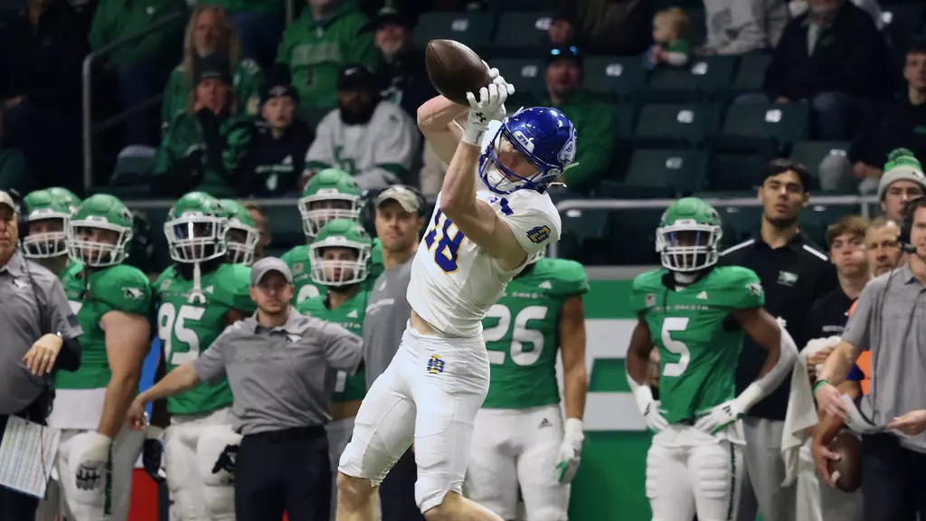 Griffin Wilde catches the football in SDSU's dominant victory over UND. Wilde's 140-yard performance was the sophomore's best game since Oklahoma State where he racked up 150 yards.