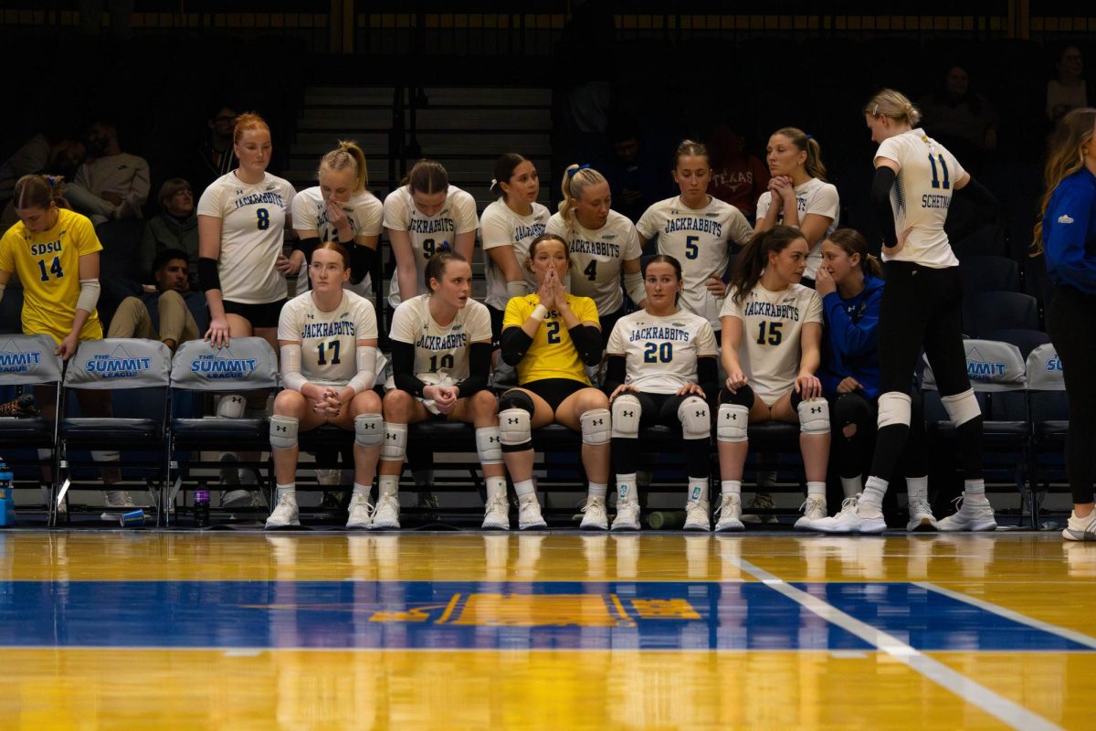 The South Dakota State volleyball team gathers around their bench after the Summit League championship game against South Dakota, Tuesday, Nov. 26, 2024, in Kansas City.