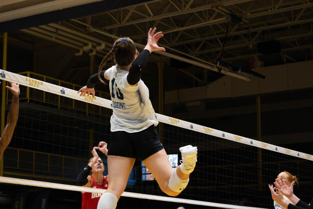 SDSU's Sylvie Zgonc leaps into the air for a swing during a Summit League Tournament game against the Denver Pioneers on Monday, Nov. 25, 2024 at the Swinney Recreation Center in Kansas City.