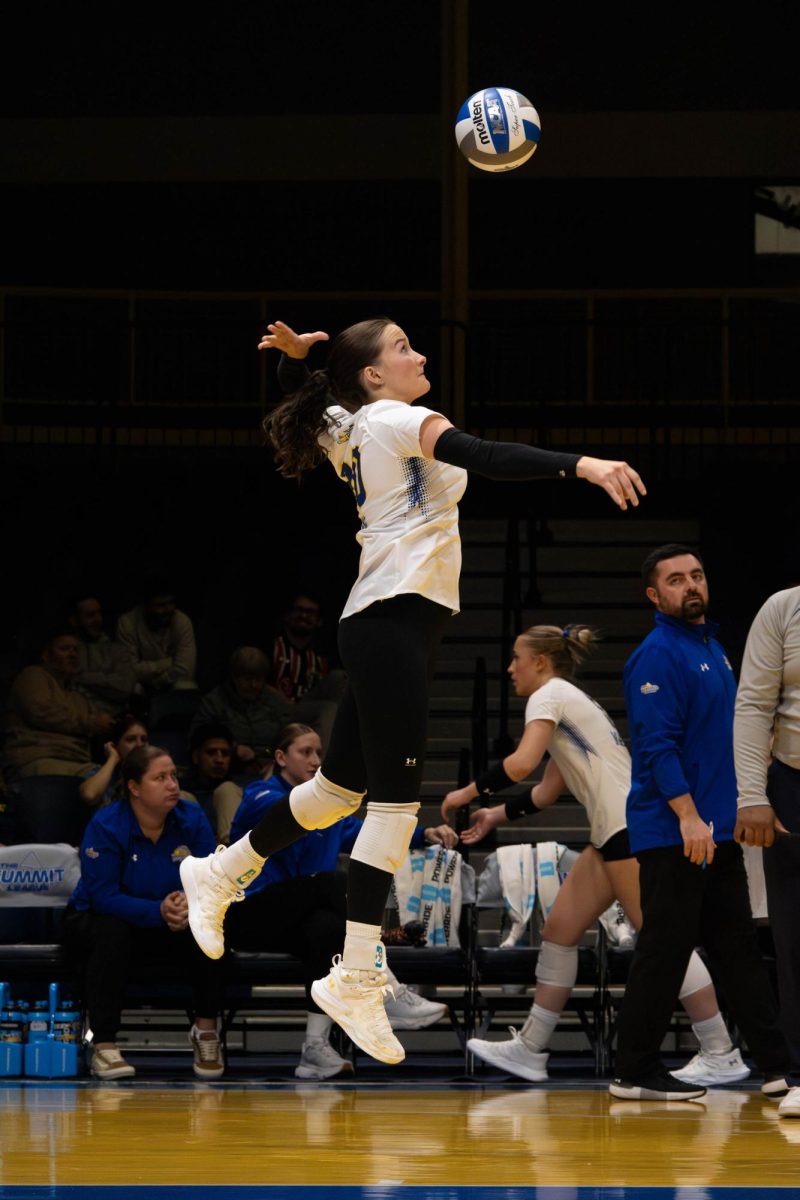 South Dakota State’s Camryn Honn (20) puts a swing on the ball during the Summit League championship game against South Dakota, Tuesday, Nov. 26, 2024, in Kansas City.