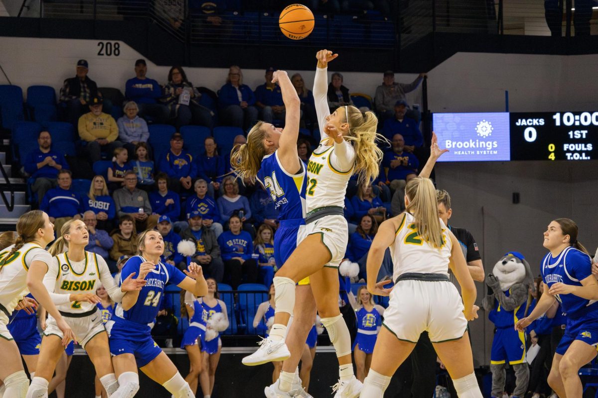 Brooklyn Meyer winning a jump ball against NDSU’s Avery Koenen in SDSU’s Victory over the Bison.