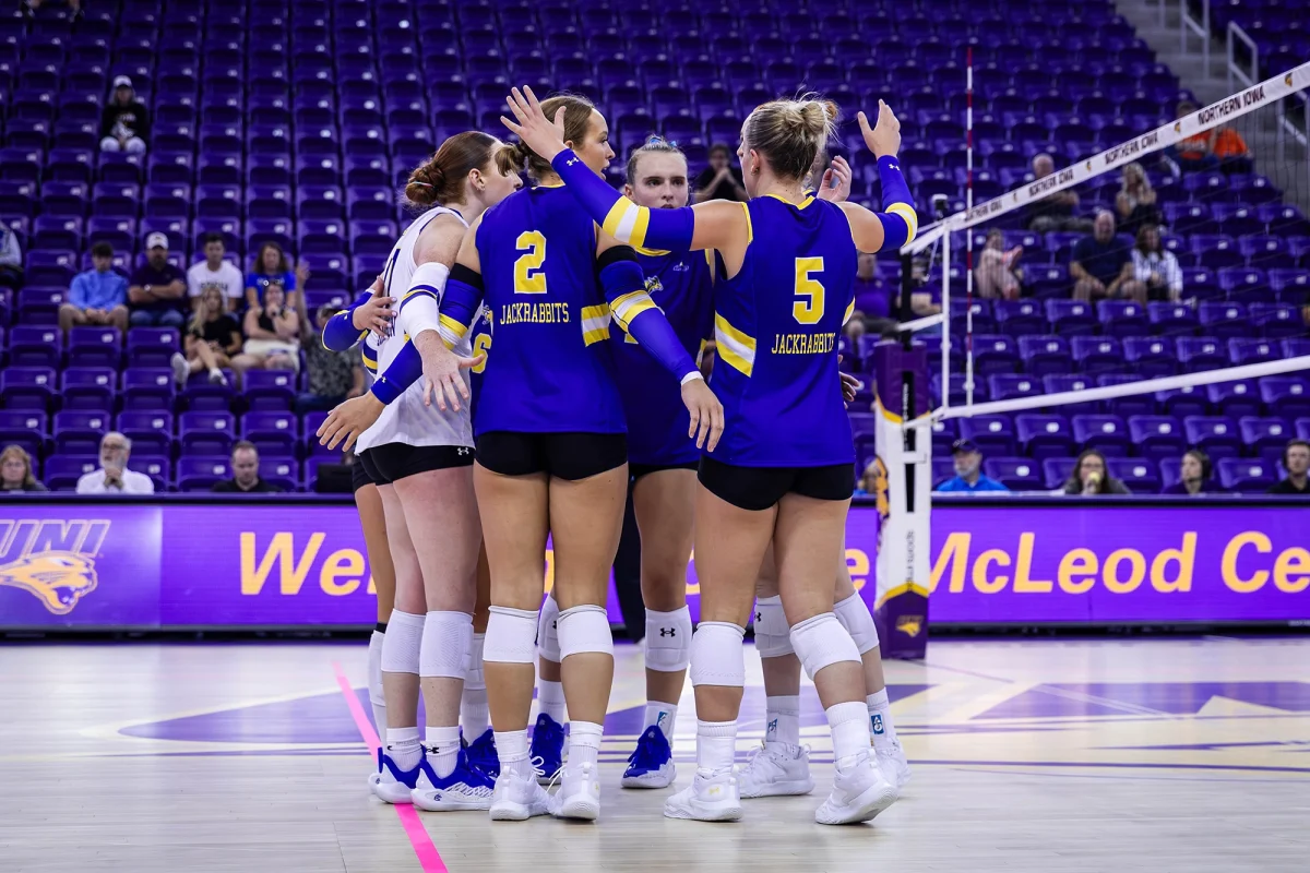 The South Dakota State volleyball team celebrates following a point during its 3-1 win over Illinois on Friday, Aug. 29, 2025, at the McLeod Center in Cedar Rapids, Iowa.