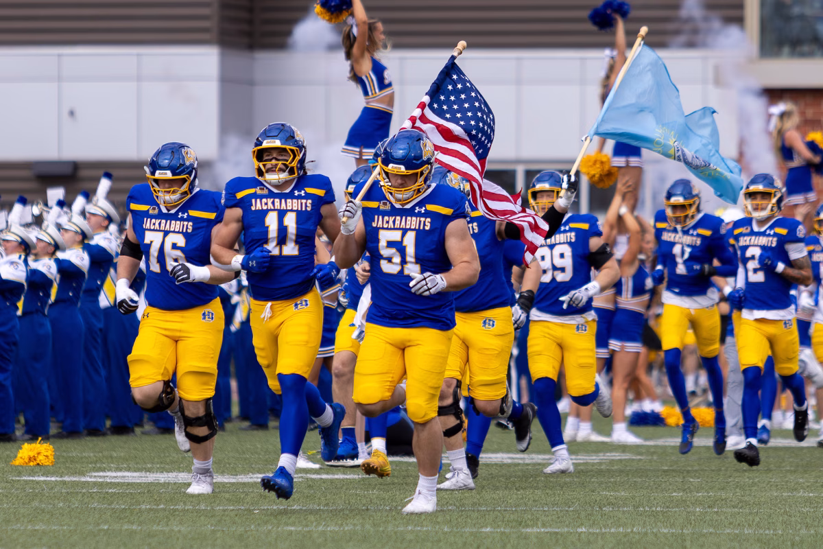 The South Dakota State football team runs out of the tunnel before its Hobo Day college football matchup against Northern Iowa on Oct. 11, 2025, at Dana J. Dykhouse Stadium in Brookings.