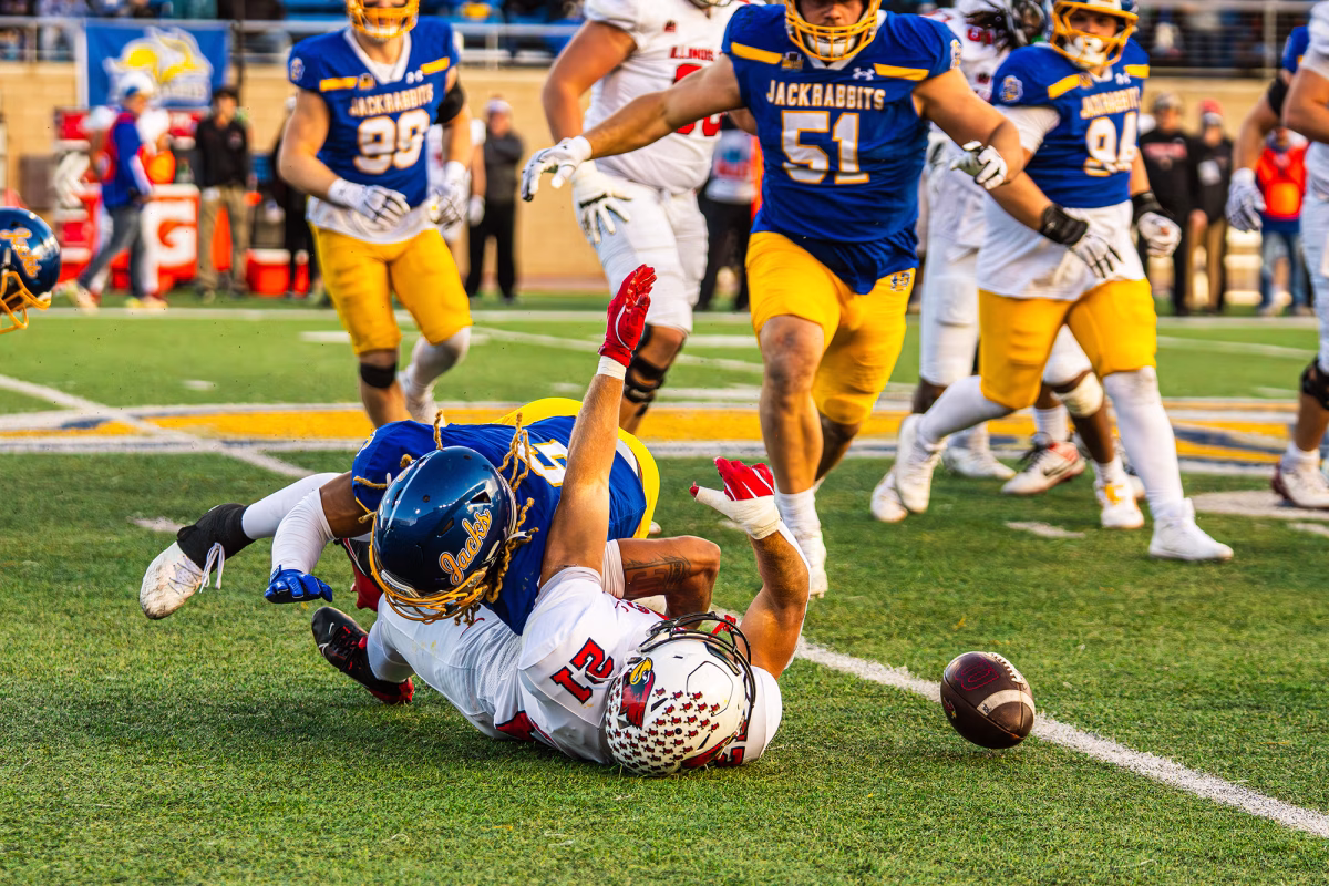 South Dakota State safety Jalen B. Lee (6) tackles Illinois State's Seth Glatz (21) during a college football game on Nov. 15, 2025, at Dana J. Dykhouse Stadium in Brookings.