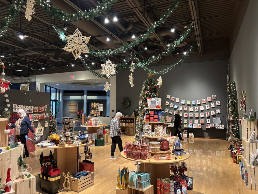 Shoppers browse at the Nordic Yule Market inside the South Dakota Art Museum on Monday, Dec. 15, 2025, in Brookings.