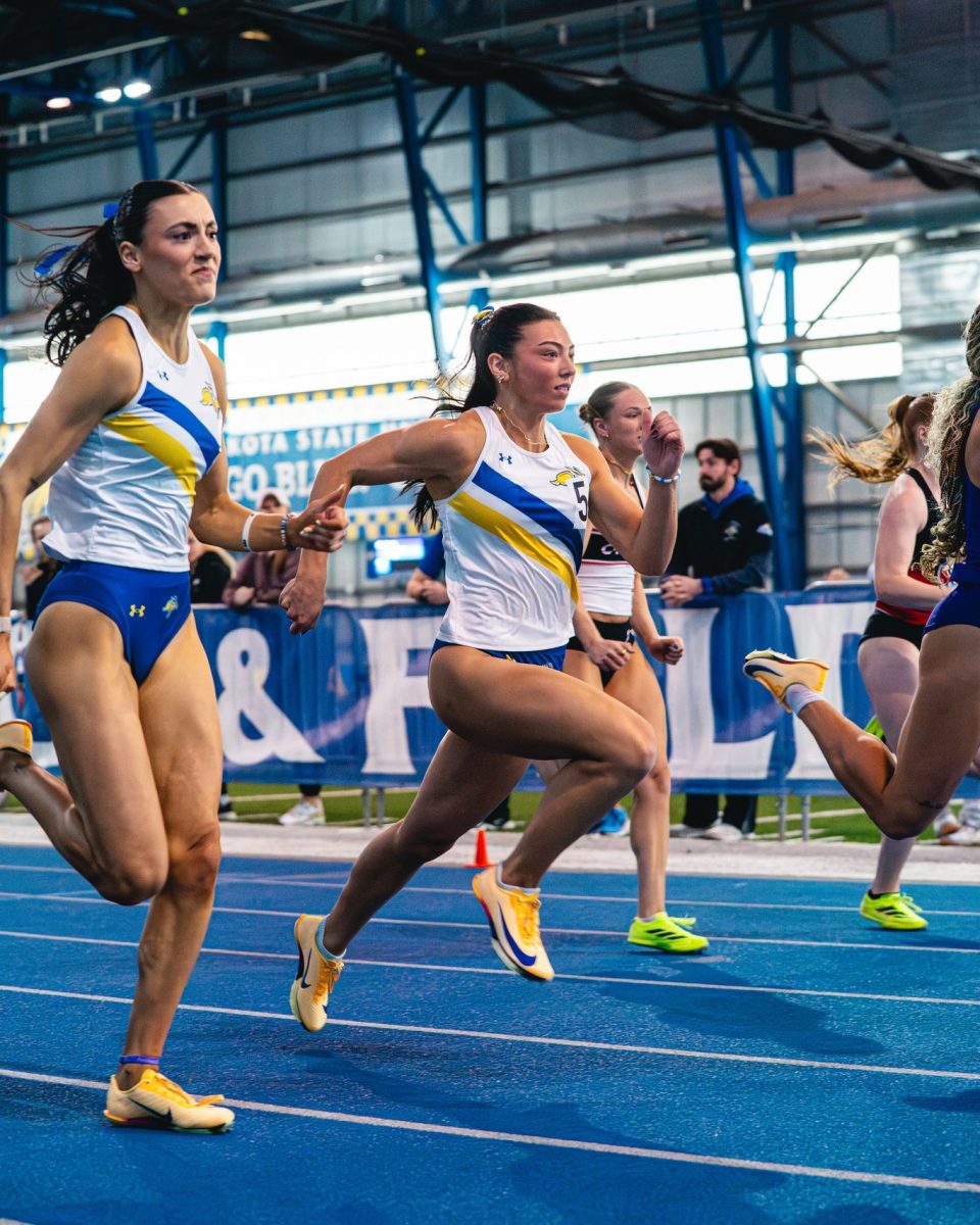 South Dakota State's Maggie Madsen, left, and Chloe Raw run a race during the Jim Emmerich Alumni Meet held inside the Sanford-Jackrabbit Athletic Complex in Brookings on Saturday, Jan. 24, 2026.