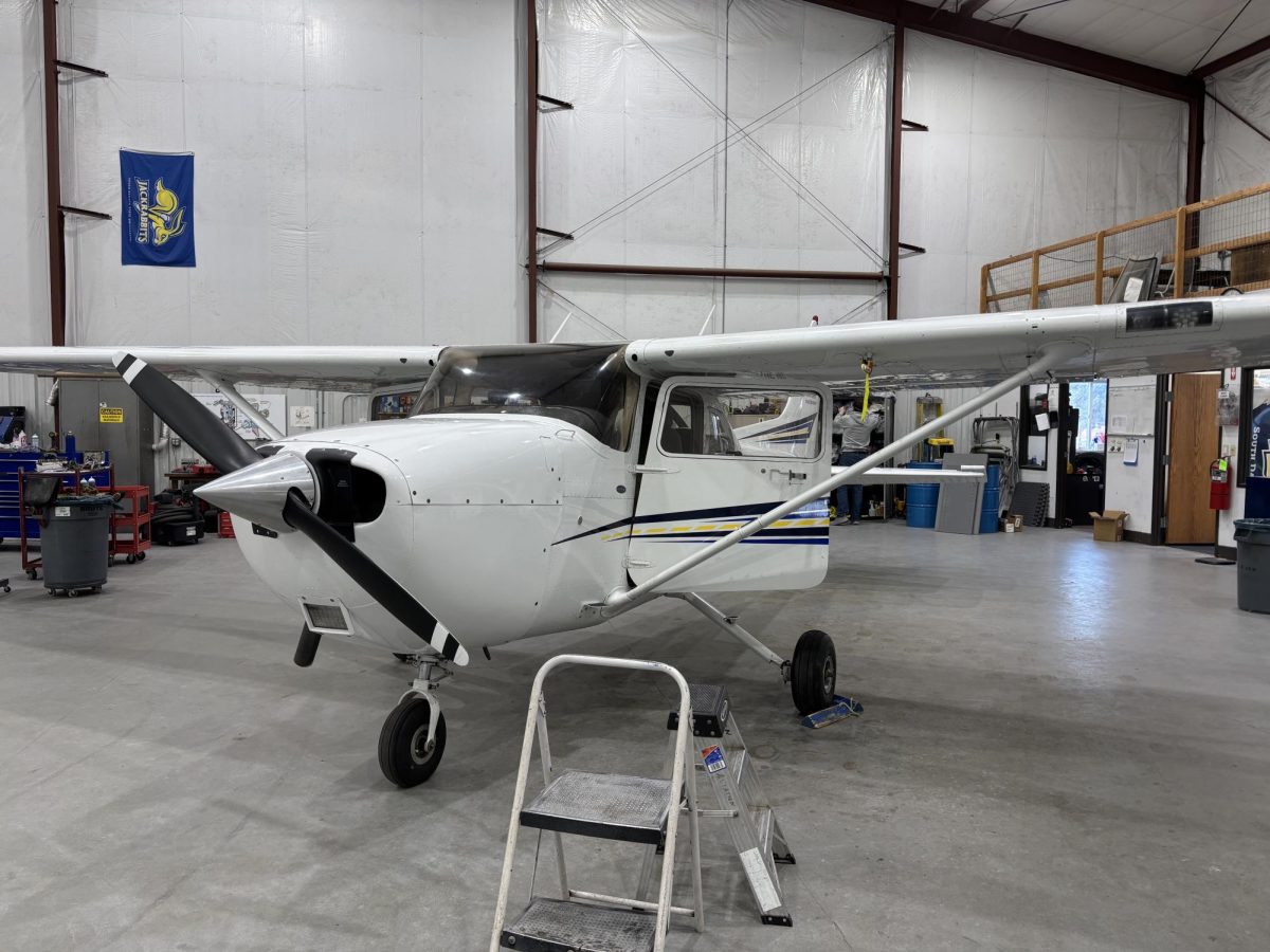 A single-engine Cessna 172 sits inside the Alan O. Tutland Hangar at the Brookings Regional Airport in Brookings. SDSU’s aviation program has 18 total airplanes; three multi-engine Piper Seminoles and 15 Cessna 172’s.