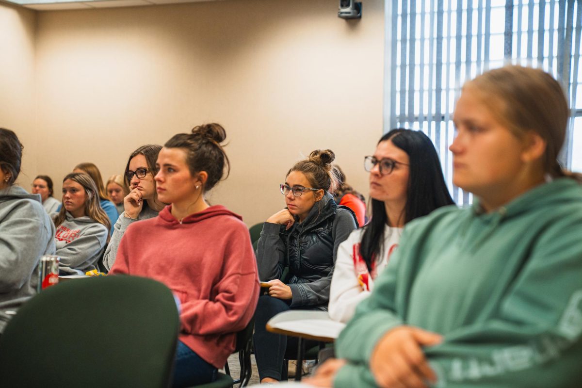 Students sit in Assistant Professor Erica Summerfield's agricultural communications class.