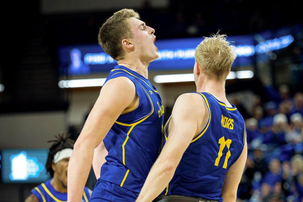 South Dakota State's Grant Wilkinson, right, chest bumps with Matthew Mors during a men's college basketball game against North Dakota State on Wednesday, Feb. 18, 2026, at First Bank & Trust Arena in Brookings.