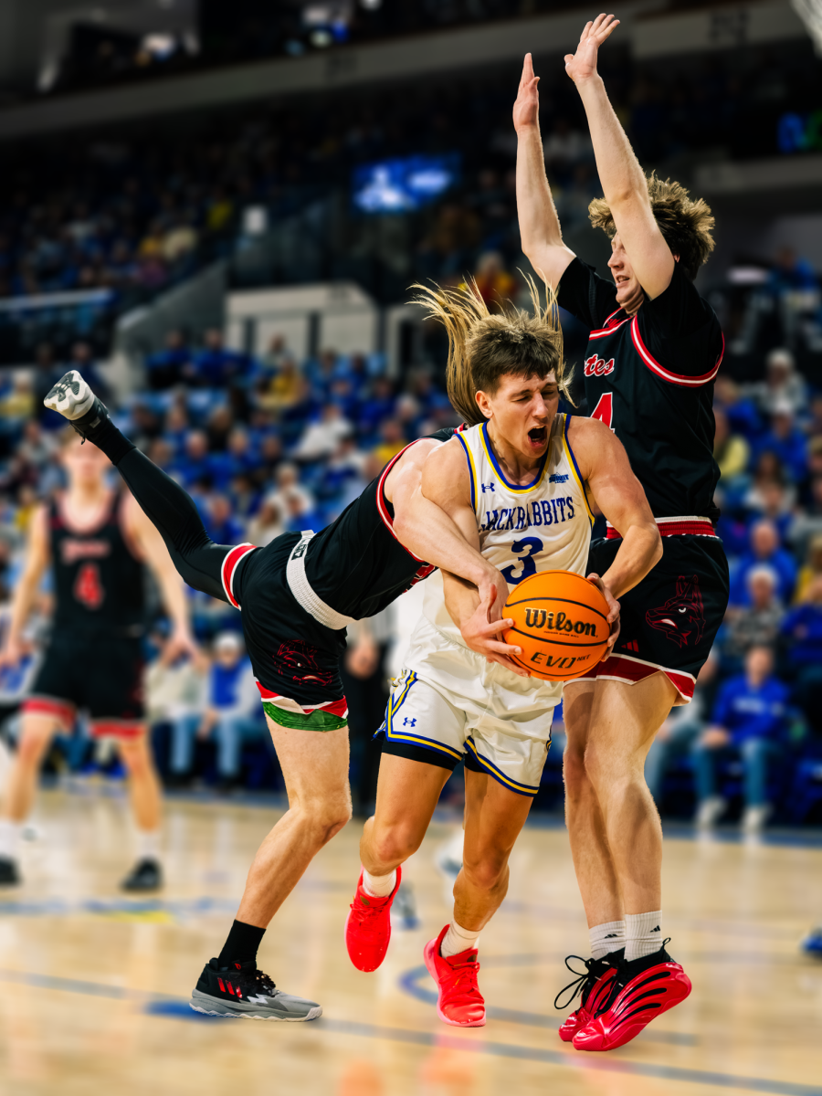 Damon Wilkinson shoots the basketball during a game against the University of South Dakota on  Feb. 7, 2026 in First Bank & Trust Arena. Wilkinson scored 18 points and had nine rebounds.