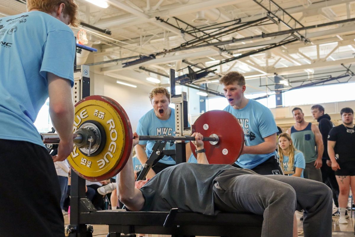 A competitor takes part in the bench press at the fourth-annual Miller Wellness Center Classic on Saturday, March 7, 2026, inside the Miller Wellness Center at South Dakota State University.