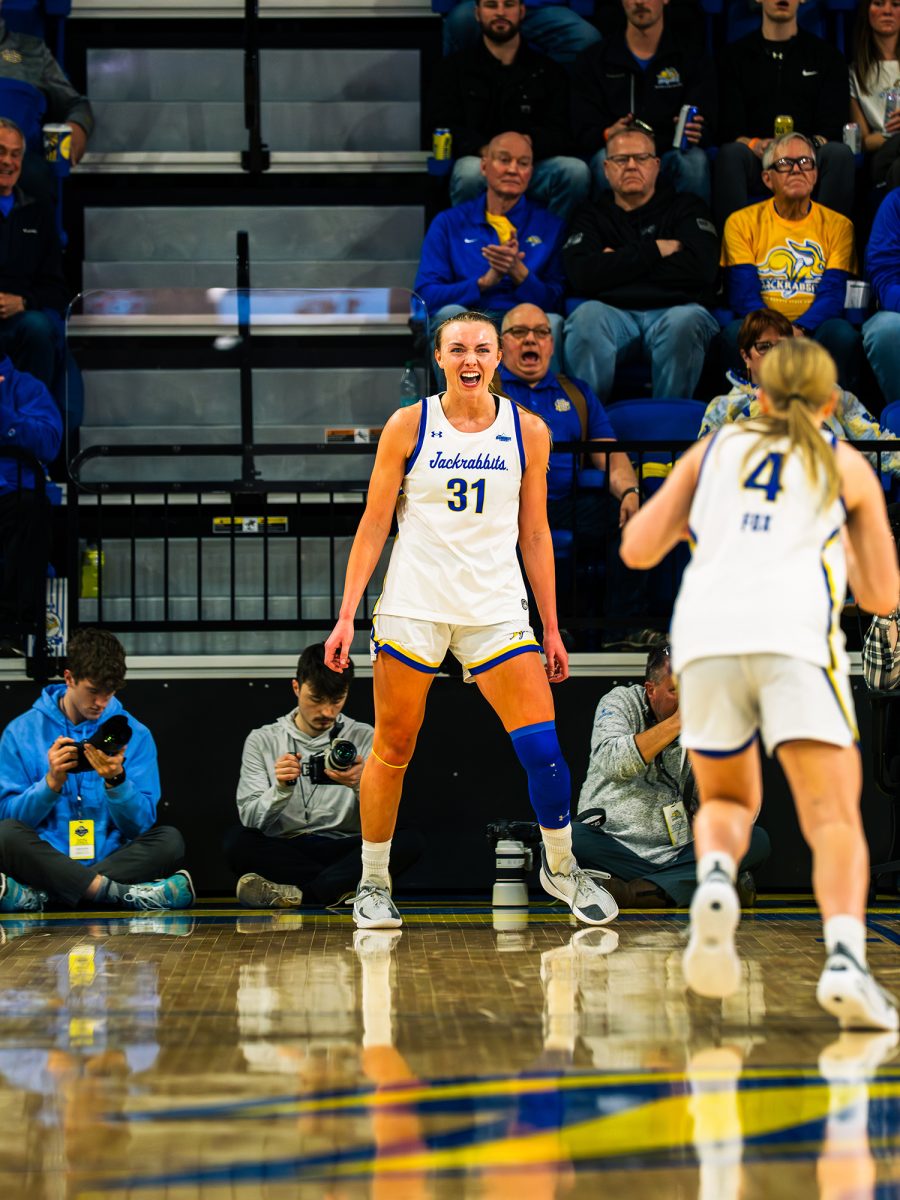 Senior Forward Brooklyn Meyer celebrate against the USD Coyotes at First Bank and Trust Arena on Saturday Feb.28. The Jacks got an 82-49 win against the Coyotes. The Jacks are now seeded second for the Summit League Tournament after the win over the Yotes.
