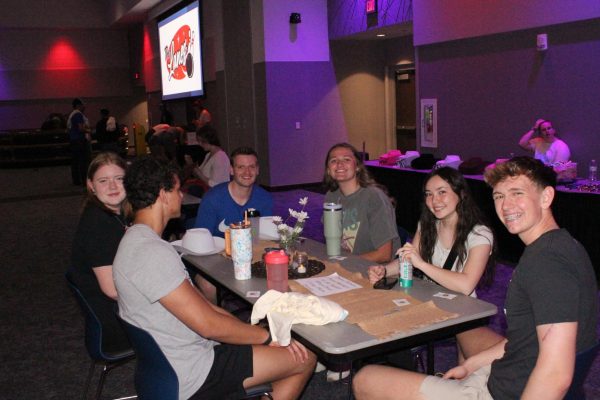 A group of attendees visit last year's May Day event in the Volstorff Ballroom in the Student Union, in Brookings, SD. 