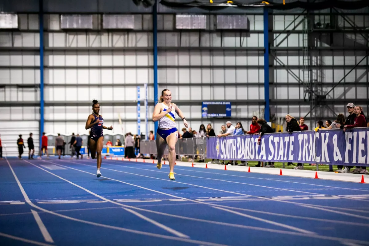 Ellie Harris runs during the Gary Wilson Invitational. Wilson broke the school 200 meter dash record with a time of 23.49.