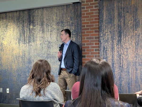 Nathan Lukkes, executive director of the South Dakota Board of Regents, speaks during a town hall in the Hobo Day Gallery on the SDSU campus on April 28, 2026. Lukkes talked about the state of higher education, potential tuition raises and artificial intelligence.